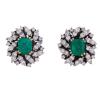 <span class='ref_item'>126 -</span> <span class="object_title">PENDIENTES EN ORO BICOLOR 18KT, ESMERALDAS Y DIAMANTES</span>  <p><span class="technical_description">Pareja de pendientes realizados en oro bicolor de 18kt. Formados por esmeraldas centrales en su talla engastadas en oro amarillo con peso total aprox 4ct y doble orla de diamantes en talla brillante con peso total aprox 3ct<br/>Cierre: Omega </span><br>Peso: <span class="PESO_HCES1">18</span> <span class="PESOUMED_HCES1">gr.</span><br></p>