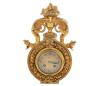 <span class='ref_item'>155 -</span> <span class="object_title">RELOJ DE SOBREMESA EN BRONCE DORADO, ESTILO NEOCLÁSICO, </span>   <p><span class="technique_material">Bronce</span><br><span class="technical_description">Reloj de cuerpo circular de sobremesa de repetición de horas y medias, realizado en bronce dorado repujado. Decorado con motivos vegetales y rematado por una copa y dragones alados a cada lado . <br/>Esfera de metal dorado con numeración arábiga. <br/>Maquinaria tipo París con numeración grabada 54889. Sin llave. <br/>En funcionamiento. <br/>Medidas: 31x17x11cm</span><br></p>