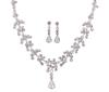 <span class='ref_item'>161 -</span> <span class="object_title">CONJUNTO DE COLLAR Y PENDIENTES EN METAL PLATEADO Y CIRCONITAS</span>  <p><span class="technical_description">Conjunto formado por un collar y pendientes realizados en metal plateado y decorados con circonitas.<br/>Cierre: Mosquetón la gargantilla, presión los pendientes<br/>Longitud: 50cm</span><br>Peso: <span class="PESO_HCES1">63,40</span> <span class="PESOUMED_HCES1">gr.</span><br></p>