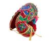 <span class='ref_item'>249 -</span> <span class="object_title">SOMBRERO REGIONAL DE CEREMONIA EXTREMEÑO. MONTEHERMOSO (CÁCERES)</span>   <p><span class="technical_description">Sombrero de mujer tipo galana de la región de Montehermoso, Cáceres. Realizada en paja trenzada y adornada con lanas de colores, cintas, botones y aplicaciones tipo espejo.<br/>De elaboración moderna.</span><br></p>