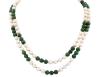 <span class='ref_item'>164 -</span> <span class="object_title">COLLAR DE PERLAS CULTIVADAS Y JADE CON BROCHE EN ORO 18KT</span>  <p><span class="technical_description">Collar de doble vuelta formado por perlas de cultivadas y cuentas esféricas de jade calibradas aprox en 8mm. Broche en oro de 18kt tipo clip<br/>Longitud: 133cm</span><br>Peso: <span class="PESO_HCES1">112,50</span> <span class="PESOUMED_HCES1">gr.</span><br></p>