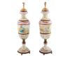 <span class='ref_item'>94 -</span> <span class="object_title">PAREJA DE JARRONES EN ORO 18KT Y ESMALTES DE VIENA, CON PUNZONES FRANCESES, S.XIX</span>   <p><span class="technical_description">Pareja de jarrones en oro 18kt con esmaltes de Viena. Base y cuello con escenas de Cupido. En zona central temas alegóricos y mitológicos, algunos basados en Rubens. La tapa superior, también en oro 18kt, representa la figura de Cupido con arco y flechas. Con punzones franceses, siglo XIX. Con analítica del oro.<br/>Peso contenido aprox de oro 18kt: 500gr<br/>Peso bruto total: 1332gr<br/>Altura: 36cm</span><br></p>