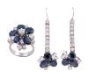 <span class='ref_item'>119 -</span> <span class="object_title">JUEGO DE PENDIENTES Y SORTIJA EN ORO 18KT, ZAFIROS Y DIAMANTES</span>  <p><span class="technical_description">Conjunto formado por una sortija y un par de pendientes realizados en oro de 18kt, con contrastes y diseño floral.<br/>La sortija con 5 zafiros talla oval con peso total aprox 5.70ct y diamantes en talla brillante con peso total aprox 1.30ct, color G y pureza SI. Se adjunta certificado de la sortija HRD NºJ210000063280.<br/>Medida Sortija: 12<br/>Los pendientes formados por hilera de diamantes en talla brillante antigua con peso total aprox 2.20ct. Penden motivos florales con zafiros talla oval de peso total aprox 10ct y diamantes talla brillante con peso total aprox 1.80ct. <br/>Cierre pendientes: Gancho<br/>Peso total aprox zafiros: 15.70ct<br/>Peso total aprox diamantes: 5.30ct</span><br>Peso: <span class="PESO_HCES1">24,90</span> <span class="PESOUMED_HCES1">gr.</span><br></p>