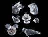 <span class='ref_item'>276 -</span> <span class="object_title">LOTE DE SIETE FIGURAS DE CRISTAL DE SWAROVSKI</span>  <p><span class="technical_description">Lote formado por 7 figuras de Swarovski representando: una tarta enana, un cerdo enano, un elefante en miniatura, un ratón, un cisne, una cabeza de águila y una pequeña foca. Se entregan en su caja original.<br/>Ref.:24-26-27-28-29-30-31</span><br>Peso: <span class="PESO_HCES1">464,60</span> <span class="PESOUMED_HCES1">gr.</span><br></p>