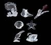 <span class='ref_item'>278 -</span> <span class="object_title">LOTE DE SIETE FIGURAS DE CRISTAL DE SWAROVSKI (III)</span>  <p><span class="technical_description">Lote formado por 7 figuras de Swarovski representando: un pájaro, una estrella de mar, una concha de mar, una caracola de mar, un pez payaso, un cisne y un tulipán rojo. Se entregan en su caja original.<br/>Ref: 40-41-42-43-45-46 -48</span><br>Peso: <span class="PESO_HCES1">542,60</span> <span class="PESOUMED_HCES1">gr.</span><br></p>