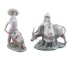 <span class='ref_item'>140 -</span> <span class="object_title">FIGURAS DE LLADRÓ</span>   <p><span class="technical_description">Pareja de figuras de Lladró representando una de ellas a una niña de Manchuria guiando a un búfalo camino del abrevadero y la otra a un niño con sombrero llevando una carretilla repleta de flores. Ambas figuras con el sello de Lladró en la base. Medidas: 23cm y 24cm de altura respectivamente.</span><br></p>