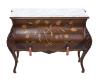 <span class='ref_item'>227 -</span> <span class="object_title">COMODA BOMBÉ ESTILO LUIS XV</span>   <p><span class="technical_description">Cómoda bombé estilo Luis XV realizada en madera de nogal ebonizada con dibujos de motivos florales. Se compone de una tapa de mármol blanco veteado y dos cajoneras con dos tiradores metálicos de color dorado cada una. Los dos tiradores de la cajonera inferior están decorados con dos borlones en color salmón. Medidas: 77cm x 101cm x 36.5cm</span><br></p>