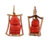 <span class='ref_item'>128 -</span> <span class="object_title">DOS COLGANTES CON FIGURA DE BUDA  EN ORO DE 18 KT Y CORAL</span>  <p><span class="technical_description">Lote formado por dos colgantes realizados en oro de 18 kt. con imagen de Buda en su parte central e interior.<br/>Medidas: 3,5 x 1,5 cm y el otro: 3,5 x 2,5 cm<br/>Peso total: 21,5gr</span><br></p>