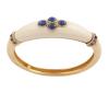<span class='ref_item'>48 -</span> <span class="object_title">PULSERA RÍGIDA EN ORO DE 18 KT. MARFIL  ANTIGUO Y ZAFIROS.</span>  <p><span class="technical_description">Pulsera rígida, realizada en oro de 18 kt. Con parte superior formada por pieza horizontal alta en la parte central de marfil antiguo adornado por cuatro cabujones ovalados de zafiros engastados en bisel y a los lados carriles con zafiros en tallas redondas ,uno de esos carriles esconde el cierre invisible de pestaña, peso total aprox. de los zafiros: 2,50 ct.<br/>Medida ovalo interior: 5,5 cm<br/>Peso: 35 gr</span><br></p>