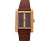 <span class='ref_item'>172 -</span> <span class="object_title">RELOJ " CHRISTIAN DIOR" EN METAL  CHAPADO EN ORO Y CORREA DE CUERO. CUERDA MANUAL</span>  <p><span class="technical_description">Reloj " CHRISTIAN DIOR" en metal chapado en oro y correa de piel con hebilla también en metal chapado en oro. Caja y esfera rectangular en tonos marrones y con franja vertical en dorado en el centro, medidas: 2 x 2,5 cm.<br/>Mecanismo de cuerda manual. En estado de marcha<br/>Peso: 18,3 gr </span><br></p>
