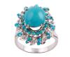 <span class='ref_item'>54 -</span> <span class="object_title">SORTIJA EN ORO DE 18 KT. CON TURQUESAS Y DIAMANTES</span>  <p><span class="technical_description">Sortija realizada en oro de 18 kt. con diseño de rosetón adornada en su centro por cabujón oval de turquesa, rodeado en orla por pequeñas turquesas redondas y pequeños diamantes en talla brillante con peso total aprox.0.10 ct.<br/>Medida sortija: 12<br/>Peso: 6,6 gr</span><br></p>