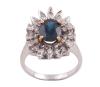 <span class='ref_item'>17 -</span> <span class="object_title">SORTIJA EN ORO DE 14 KT. CON ZAFIRO Y DIAMANTES</span>  <p><span class="technical_description">Sortija realizada en oro de 14 kt. con zafiro central en talla oval montado sobre garras con peso aprox. 1.10 ct y orla de pequeños diamantes en talla brillante con peso total aprox. 0.20 ct<br/>Medida sortija: 10<br/>Peso: 5,5 gr</span><br></p>