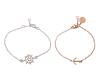 <span class='ref_item'>14 -</span> <span class="object_title">DOS PULSERAS EN PLATA 925. UNA DE ELLAS DE "ARISTOCRAZY"</span>  <p><span class="technical_description">Lote compuesto por dos pulseras realizadas en plata 925. Una de ellas con detalle de timón, cadena barbada y cierre mosquetón. La otra en plata 925 dorada con plaquita de "Aristocrazy"y detalle en el centro de ancla, con cadena rolo, y cierre mosquetón<br/>Longitud: 18 cm la del detalle del timón y 16 cm la de "Aristocrazy", ambas lleban arandelas para poner más cortas.<br/>Peso Total: 4,4 gr</span><br></p>