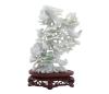<span class='ref_item'>122 -</span> <span class="object_title">ESCULTURA DE JADE TALLADO</span>   <p><span class="technique_material">Jade</span><br><span class="technical_description">Escultura realizada en jade tallado de color blanco con tonos verdosos que representa una escena natural con aves, (probablemente fénix o grullas) posadas sobre un árbol o rama con flores, (probablemente peonías) que simbolizan la buena fortuna. La escultura descansa sobre una base de madera tallada. Pequeño desperfecto en el pico de una de las aves.<br/>Medidas: 27.5cm x 16.5cm x 11cm</span><br></p>