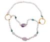 <span class='ref_item'>66 -</span> <span class="description">COLLAR LARGO CON PERLAS CULTIVADAS, AMAZONITAS Y CUARZOS AMATISTA E HIALINO. APLICACIONES EN METAL DORADO</span>  <p><span class="description">Collar largo con original diseño formado por perlas cultivadas en agua dulce calibradas aprox(10 - 12 mm) , amazonitas en tallas irregulares y facetadas , cuarzos amatistas en tallas grandes fantasía y cuarzo hialinos tallados. Se completa el conjunto con dos grandes aros y aplicaciones en metal dorado. Longitud: 66 cm<br>Peso: 165,10 gr.</span></p>