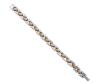 <span class='ref_item'>174 -</span> <span class="object_title">PULSERA EN PLATA DE LEY 925 Y BRONCE</span>  <p><span class="technical_description">Pulsera realizada en plata de ley 925 y bronce, con eslabones fantasía en forma de cruz o reloj de arena unidos por los eslabones en bronce. En la parte posterior, en tres eslabones consecutivos, presenta la grabación: 17 - 04    925  MEX<br/>Cierre: Pestaña. Longitud:19 cm <br/> <br/> </span><br>Peso: <span class="PESO_HCES1">43</span> <span class="PESOUMED_HCES1">gr.</span><br></p>