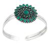 <span class='ref_item'>65 -</span> <span class="object_title">PULSERA  ABIERTA Y RÍGIDA EN PLATA DE LEY 925 CON ADORNO DE PIEDRAS VERDES</span>  <p><span class="technical_description">Pulsera abierta y rígida realizada en plata de ley 925, con adorno en la parte superior de gran roseta formada por piedras verdes en bonita composición de tallas marquises y redondas.<br/>Medida diametral: 6,5 cm</span><br>Peso: <span class="PESO_HCES1">24,90</span> <span class="PESOUMED_HCES1">gr.</span><br></p>