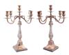 <span class='ref_item'>257 -</span> <span class="object_title">CANDELABROS EN PLATA DE LEY 925</span>  <p><span class="technical_description">Lote compuesto por dos candelabros de gran estatura realizados en plata de ley 925 mm. Con punzón.<br/>Medidas: 45 cm x 37 cm<br/>Peso neto aprox de la plata: 2.126 gr<br/>Peso bruto total: 2.740 gr</span><br></p>