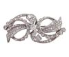 <span class='ref_item'>121 -</span> <span class="object_title">BROCHE VINTAGE EN PLATINO CON DIAMANTES</span>  <p><span class="technical_description">Broche vintage, realizado en platino  con diseño de gran lazo adornado todo él por diamantes en tallas brillante y baguette ( faltan un pequeño brillante y pequeña baguette) , engastados en carriles y bandas ondulados con peso total aprox de 2.4 ct<br/>Cierre: aguja con mecanismo de seguridad ( la aguja en oro de 18 kt)<br/>Medidas: 5,5 cm x 2,5 cm </span><br>Peso: <span class="PESO_HCES1">20,3</span> <span class="PESOUMED_HCES1">gr.</span><br></p>