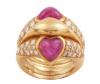 <span class='ref_item'>173 -</span> <span class="object_title">SORTIJA EN ORO DE 18 KT CON DOS RUBIES EN CABUJÓN CON FORMA DE CORAZON Y DIAMANTES</span>  <p><span class="technical_description">Sortija de original diseño realizada en oro de 18 kt. Ancha, adornada por dos rubíes en cabujón con forma de corazón y peso total aprox de 1.50 ct y por diamantes en talla brillante sobre los hombros engastados en pavés con peso total aprox de 0.65 ct<br/>Medida sortija: 12</span><br>Peso: <span class="PESO_HCES1">12,5</span> <span class="PESOUMED_HCES1">gr.</span><br></p>