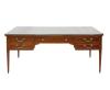 <span class='ref_item'>175 -</span> <span class="object_title">MESA DE ESCRITORIO DE ESTILO CLÁSICO EN CAOBA</span>   <p><span class="technical_description">Mesa de escritorio de estilo clásico realizada en madera de caoba. Cuenta con 5 cajones, uno central más grande y dos a cada lado. Cada uno de ellos con tiradores metálicos dorados. Con cristal sobre la tapa para protegerla. Patas troncocónicas acanaladas. Ligeras marcas por el uso y el paso del tiempo. Todos los cajones tienen cerradura. Sin llave. Medidas: 78.5cm x 184cm x 86cm.</span><br></p>