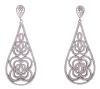 <span class='ref_item'>76 -</span> <span class="object_title">PENDIENTES LARGOS EN PLATA DE LEY 925 CALADOS Y ADORNADOS POR CIRCONITAS</span>  <p><span class="technical_description">Pareja de pendientes largos realizados en plata de ley 925, con forma de grandes gotas caladas y con motivos florales adornados por circonitas. Cierre: Presión. Longitud: 5,50 cm<br/> </span><br>Peso: <span class="PESO_HCES1">15,6</span> <span class="PESOUMED_HCES1">gr.</span><br></p>