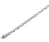 <span class='ref_item'>48 -</span> <span class="object_title">PULSERA RIVIÊRE EN ORO DE 18 KT, CON DIAMANTES, APROX. 3.36 CT</span>  <p><span class="technical_description">Pulsera Riviêre realizada en oro de 18 kt. con 37 diamantes en talla brillante engastados en chaton con bisel en terminación mate y peso total aprox. de 3.36 ct. Cierre: Caja con lengüeta y doble ocho de seguridad. Longitud: 17 cm<br/>Ref. 78419 <br/> </span><br>Peso: <span class="PESO_HCES1">14,60</span> <span class="PESOUMED_HCES1">gr.</span><br></p>
