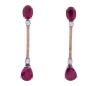 <span class='ref_item'>12 -</span> <span class="object_title">PENDIENTES EN ORO BICOLOR DE 18 KT. CON RUBIES, DIAMANTES Y DIAMANTES COLOR CHAMPAGNE</span>  <p><span class="technical_description">Pareja de pendientes realizados en oro bicolor de 18kt. compuestos por rubíes en talla oval y peso total aprox. de 5 ct. barra vertical adornada por diamantes en talla brillante con peso total aprox. de 0.30 ct y por diamantes color champagne en talla brillante engastados en garras sobre oro rosado con peso total aprox. de 0.20 ct<br/>Cierre: Presión. Longitud: 3,5 cm</span><br>Peso: <span class="PESO_HCES1">4,6</span> <span class="PESOUMED_HCES1">gr.</span><br></p>