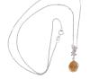 <span class='ref_item'>113 -</span> <span class="object_title">COLGANTE Y CADENA EN ORO DE 18 KT. CON CITRINO Y DIAMANTES</span>  <p><span class="technical_description">Colgante y cadena realizados en oro de 18 kt. El colgante con citrino central en talla cabujón oval engastado en garra con peso aprox. 2.50ct, y detalle de estrellas cuajadas de diamantes en talla brillante con peso total aprox. 010 ct. Cadena de fino eslabón barbado y cierre con reasa. Longitud: 40 cm</span><br>Peso: <span class="PESO_HCES1">2,6</span> <span class="PESOUMED_HCES1">gr.</span><br></p>