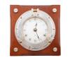 <span class='ref_item'>79 -</span> <span class="object_title">RELOJ MAXTOR DE CUARZO CON DISEÑO NÁUTICO MONTADO SOBRE UNA BASE DE MADERA CUADRADA.</span>   <p><span class="technical_description">Reloj marca Maxtor realizado en metal. El diseño incorpora elementos náuticos tradicionales como una esfera analógica con números romanos. El marco del reloj imita la forma de un ojo de buey de barco. En funcionamiento.<br/>Medidas: 17.5 x 17.5cm</span><br></p>
