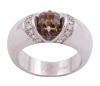 <span class='ref_item'>67 -</span> <span class="object_title">SORTIJA EN ORO DE 18 KT. CON DIAMANTES Y DIAMANTE CENTRAL BROWN</span>  <p><span class="technical_description">Sortija realizada en oro de 18 kt. Con diamante central color Brown Fansy en talla esmeralda y peso aprox. 1.35 ct. estimación de pureza: SI.<br/>Va rodeado por bandas de diamantes en talla brillante con peso total aprox. 0.22 ct.<br/>Estimación de color: H - I. Estimación de pureza: VS - SI<br/>Con Certificado HRD Nº 200000023162<br/>Medida sortija: 12</span><br>Peso: <span class="PESO_HCES1">11,96</span> <span class="PESOUMED_HCES1">gr.</span><br></p>