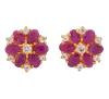 <span class='ref_item'>135 -</span> <span class="object_title">PENDIENTES EN PLATA DE LEY 925 CHAPADOS EN ORO, CON RUBIES Y TOPACIOS BLANCOS. JOYA EXCLUSIVA MODERNA</span>  <p><span class="technical_description">Pareja de pendientes realizados en plata de ley 925 chapada en oro, con forma de flor compuesta por rubíes masivos en talla oval como pétalos con peso total aprox. 6 ct y adorno de topacios blancos en talla redonda con peso total aprox. 0.30 ct<br/>Ref: 2187<br/>Cierre: Presión</span><br>Peso: <span class="PESO_HCES1">6</span> <span class="PESOUMED_HCES1">gr.</span><br></p>