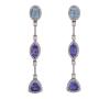 <span class='ref_item'>7 -</span> <span class="object_title">PENDIENTES EN ORO DE 18 KT. CON AGUAMARINAS, TANZANITAS Y DIAMANTES</span>  <p><span class="technical_description">Pareja de pendientes realizados en oro de 18 kt. Largos, compuestos por aguamarinas en talla oval con peso total aprox. 1 ct y por tanzanitas en tallas marquise y trillón con peso total aprox. 2 ct. adornadas por diamantes en talla brillante con peso total aprox. 1 ct.<br/>Cierre: Presiones<br/>Longitud: 5 cm</span><br>Peso: <span class="PESO_HCES1">6,8</span> <span class="PESOUMED_HCES1">gr.</span><br></p>
