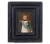 <span class='ref_item'>16 -</span> <span class="object_title">"RETRATO DE NAPOLEÓN BONAPARTE"</span>   <p><span class="author">Atribuido a François GÉRARD (1770-1837)</span> <br><span class="technique_material">Óleo sobre lienzo</span><br><span class="technical_description">La obra representa a Napoleón Bonaparte de busto, con uniforme militar, banda azul y condecoraciones.<br/>François Gérard, conocido como el Barón Gérard, fue un importante pintor francés del Neoclasicismo, especialmente célebre por sus retratos. Fue uno de los artistas que contribuyeron a crear la imagen oficial de Napoleón Bonaparte, realizando retratos del emperador y de su entorno.<br/>En el reverso de la obra se pueden apreciar un sello de lacre oscuro en el bastidor, una etiqueta de papel antigua que lleva la inscripción "LE BARON GÉRARD" y una etiqueta de papel antigua pegada en el lienzo con una corona. Esto indica que la obra perteneció a una colección noble o inventario real específico.<br/>Enmarcado en un antiguo marco de madera negra. Marco presenta pequeños deterioros. Medidas con marco: 32 x 27cm. Medidas del lienzo: 18 x 13cm.</span><br></p>