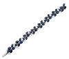 <span class='ref_item'>55 -</span> <span class="object_title">PULSERA EN ORO DE 18 KT. CON ZAFIROS Y DIAMANTES</span>  <p><span class="technical_description">Pulsera realizada en oro de 18 kt. con elegante diseño floral. Esta compuesta por 40 zafiros en talla oval con peso total aprox. de 43.70 ct. adornados por diamantes en talla brillante con peso total aprox. 5 ct. <br/>Cierre: Caja con lengüeta y sistema de seguridad. Medidas: 16,50 cm x 1,40 cm</span><br>Peso: <span class="PESO_HCES1">37,90</span> <span class="PESOUMED_HCES1">gr.</span><br></p>