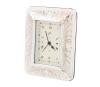 <span class='ref_item'>97 -</span> <span class="object_title">RELOJ DE SOBREMESA DE LA MARCA ALCUDIA CON MARCO EN PLATA DE LEY 925MM</span>   <p><span class="technical_description">Reloj de sobremesa con movimiento de cuarzo y marco de plata de ley 925mm de la marca Alcudia.<br/>Esfera rectángular en tono crema con números romanos negros y manecillas de estilo tradicional.<br/>Punzón en el ángulo inferior derecho del marco. <br/>Trasera en madera con acabado de raíz de nogal.<br/>En funcionamiento. Medidas: 12.5 x 10cm</span><br></p>