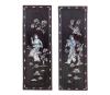 <span class='ref_item'>26 -</span> <span class="object_title">PAREJA DE PANELES DECORATIVOS ORIENTALES EN MADERA Y NÁCAR</span>   <p><span class="technical_description">Pareja de paneles decorativos orientales realizados en madera oscura con incrustaciones artesanales de nácar representando figuras tradicionales rodeadas de elementos florales.<br/>Con ligeras marcas en la madera por el paso del tiempo. Medidas: 31 x 10.5cm</span><br></p>