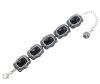 <span class='ref_item'>193 -</span> <span class="object_title">PULSERA EN PLATA DE LEY 925 CON GRANDES ELABONES DE CRISTALES NEGROS Y CIRCONITAS BLANCAS Y NEGRAS</span>  <p><span class="technical_description">Pulsera realizada en plata de ley 925 formada por grandes eslabones con cristales facetados negros rodeados por circonitas blancas y negras<br/>Cierre: Mosquetón. Longitud: 20 cm con alargador terminado en bolita decorada </span><br>Peso: <span class="PESO_HCES1">31,5</span> <span class="PESOUMED_HCES1">gr.</span><br></p>