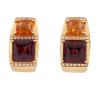 <span class='ref_item'>70 -</span> <span class="object_title">PENDIENTES EN ORO DE 18 KT. CON GRANATES,CITRINOS Y DIAMANTES</span>  <p><span class="technical_description">Pareja de pendientes realizados en oro de 18 kt. con granates y citrinos en talla cabujón cuadrada y adorno de diamantes en talla brillante con peso total aprox. 0.64 ct.<br/>Cierre: Omega<br/>Ref: 69610</span><br>Peso: <span class="PESO_HCES1">19,2</span> <span class="PESOUMED_HCES1">gr.</span><br></p>