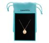 <span class='ref_item'>1 -</span> <span class="object_title">COLGANTE " TIFFANY & CO " Y CADENA EN ORO DE 18 KT. </span>  <p><span class="technical_description">Colgante "TIFANY & CO " y cadena realizados en oro de 18 kt. El colgante con forma de esfera y asa para colgar lleva grabado en su parte superior: " TIFFANY & CO NEW YOR "<br/>Cadena fina veneciana con cierre de reasa. Longitud: 40 cm<br/>Caja y bolsita originales de: TIFFANY & CO<br/>Refs: 77432 / 76675</span><br>Peso: <span class="PESO_HCES1">6,50</span> <span class="PESOUMED_HCES1">gr.</span><br></p>