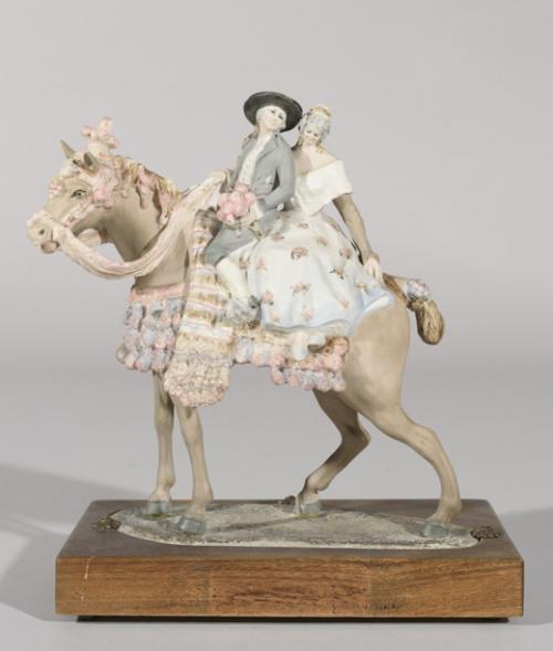 Pareja de valencianos a caballo
