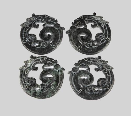 CONJUNTO DE 4 ACCESORIOS DE PODER. CHINA, S.XX