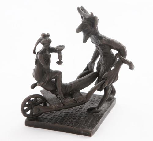 PEQUEÑA ESCULTURA DE BRONCE PATINADO REPRESENTADO A UN DEMO