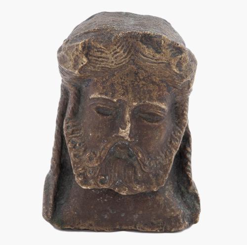 TRABAJO ESCULTÓRICO REPRESENTANDO UN ROSTRO ANCIANO EN BRON
