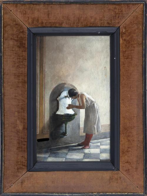 JOVEN LAVÁNDOSE LAS MANOS